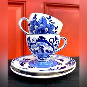 A Pair of Delft Blue Teacups With Saucers